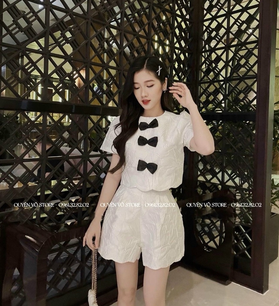 Set trắng đen quần đùi nơ ngực - M
