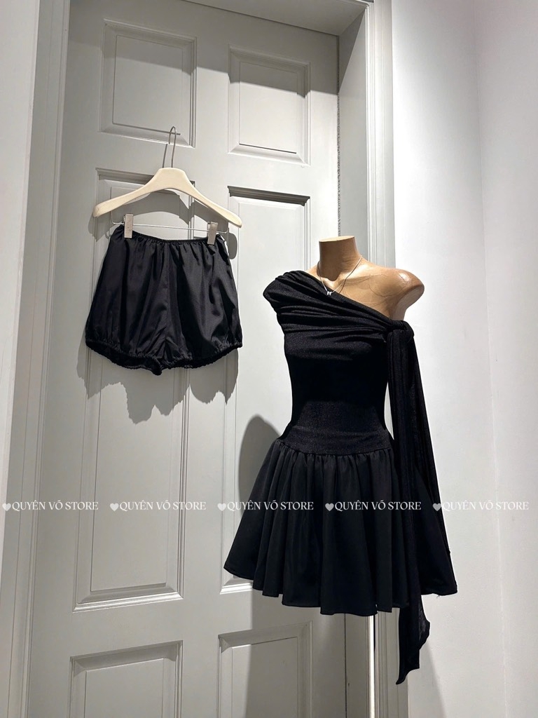 Đầm nhún lệch vai cột nơ - Đen