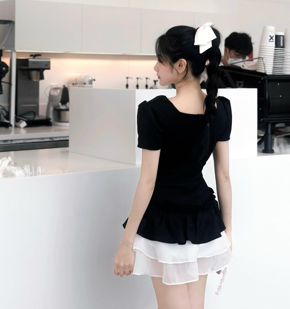Đầm đen phối tơ cột nơ