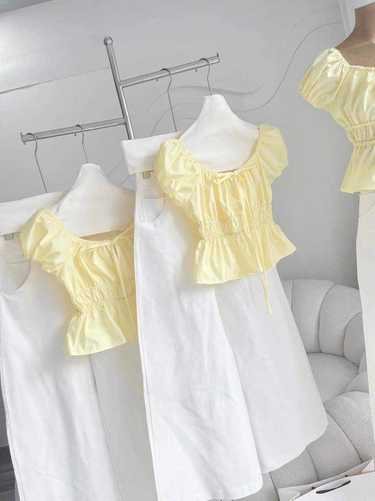Set áo nhún tay phồng quần suông trắng