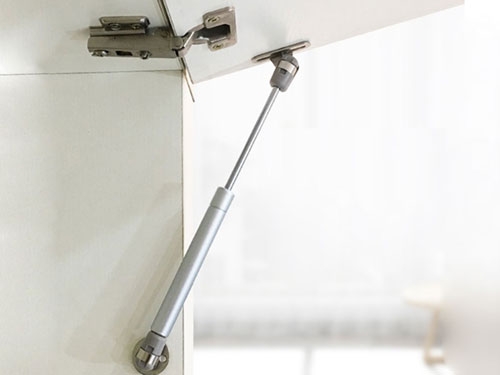 tay nâng cánh tủ bếp