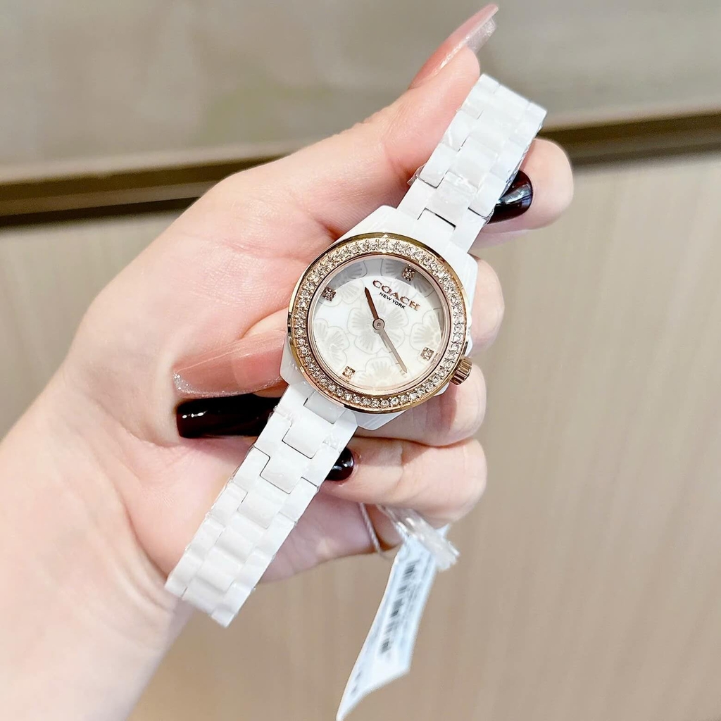 Đồng Hồ Nữ Coach Ceramic Trắng Viền Đá Mặt Họa Tiết Hoa Trà Size 33mm Vỏ Rose Quartz