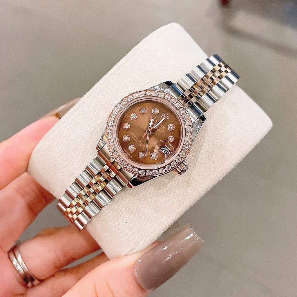 Đồng Hồ Rolex Datejust Nữ Size 28mm Dây Thép Demi Mặt Vàng Hồng Mặt Nâu Máy Pin Niềng Đính Đá