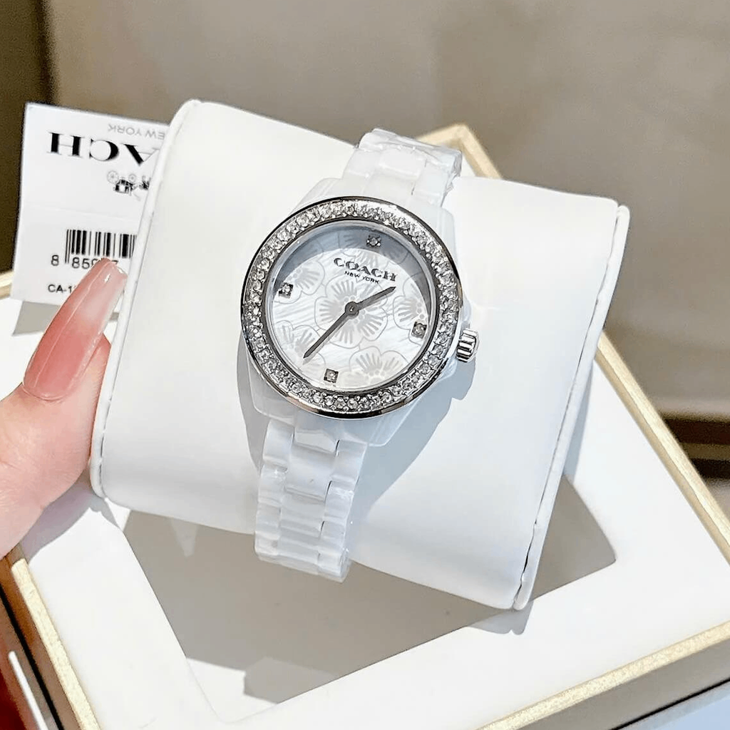 Đồng Hồ Nữ Coach Ceramic Trắng Viền Đá Mặt Họa Tiết Hoa Trà Size 33mm Vỏ Silver Quartz