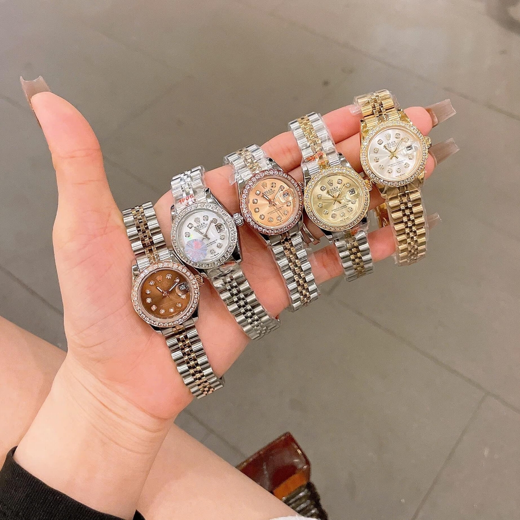 Đồng Hồ Rolex Datejust Nữ Size 28mm Dây Thép Silver Mặt Xà Cừ Trắng Máy Pin Niềng Đá