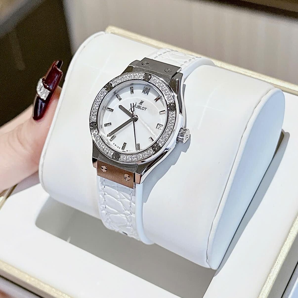 Đồng Hồ Nữ Hublot Classic Fusion Dây Da Trắng Mặt Xà Cừ Vỏ Silver Viền Đá Size 30mm Quartz