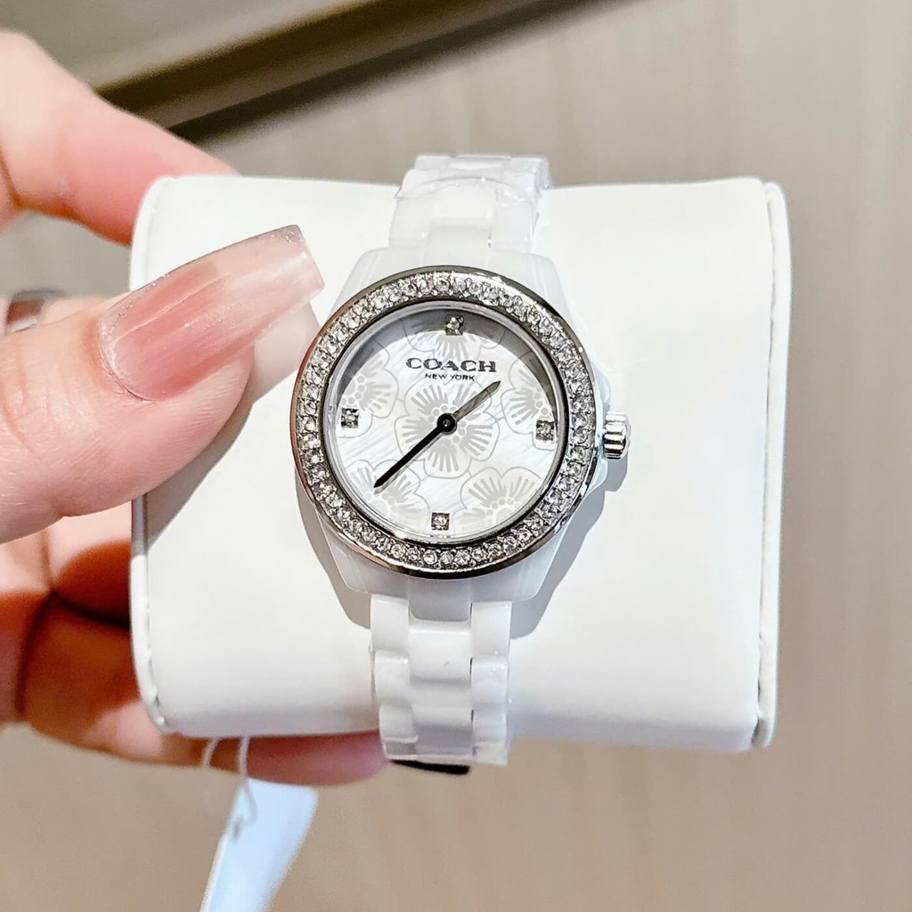 Đồng Hồ Nữ Coach Ceramic Trắng Viền Đá Mặt Họa Tiết Hoa Trà Size 33mm Vỏ Silver Quartz