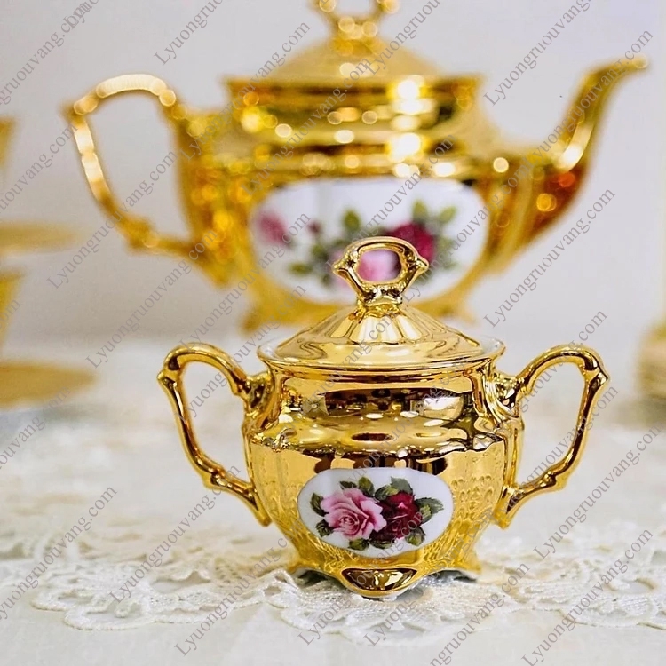 Bộ bình trà sứ hoa hồng trang trí vàng