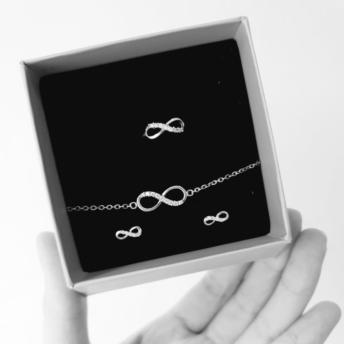 Bộ dây chuyền, khuyên tai và nhẫn họa tiết vô cực