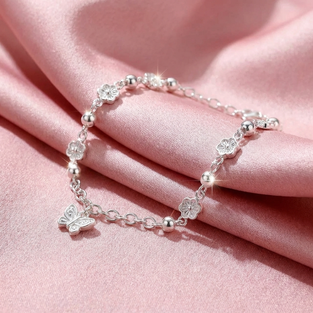 Lắc Tay Bạc Nguyên Chất 99 Cho Nữ - Chuỗi Nơ Bạc Mix Charm - LT99N010