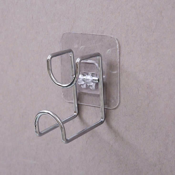 MÓC THÉP TREO CHẬU DÁN TƯỜNG (Treo sau 10 tiếng dán) (0.5)