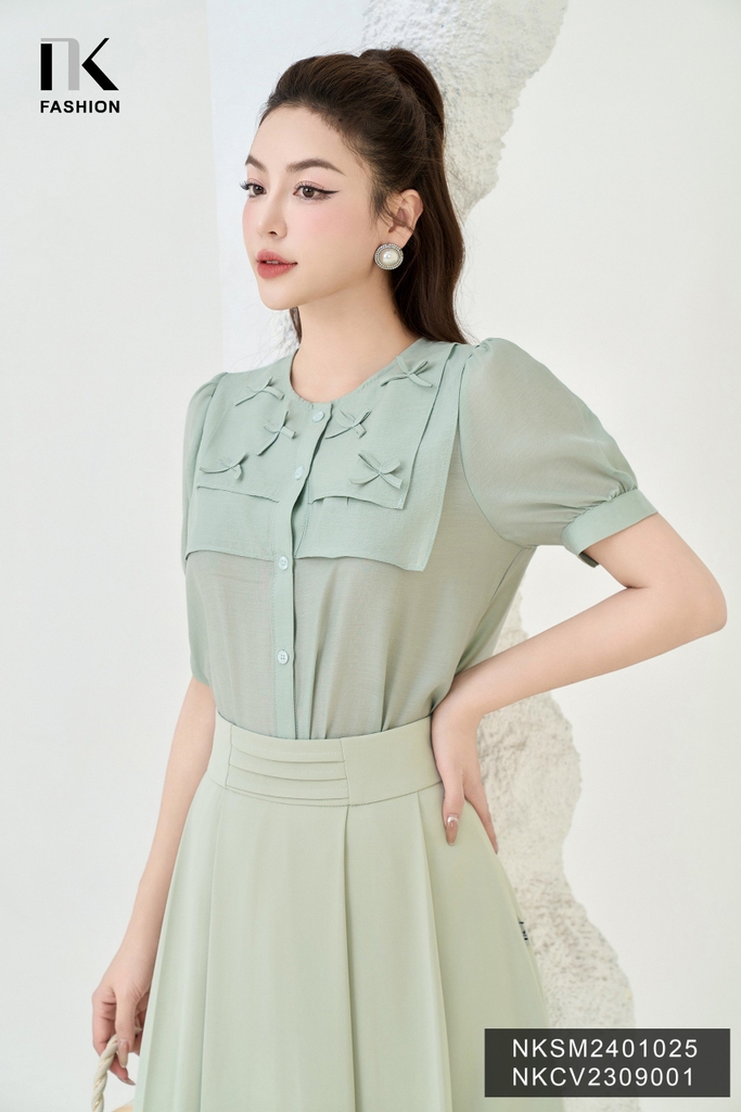 NK Fashion Áo Sơ Mi Cổ Tròn Tay Lỡ Đính Nơ Dập Cổ Tiểu Thư, Trẻ Trung NKSM2401025