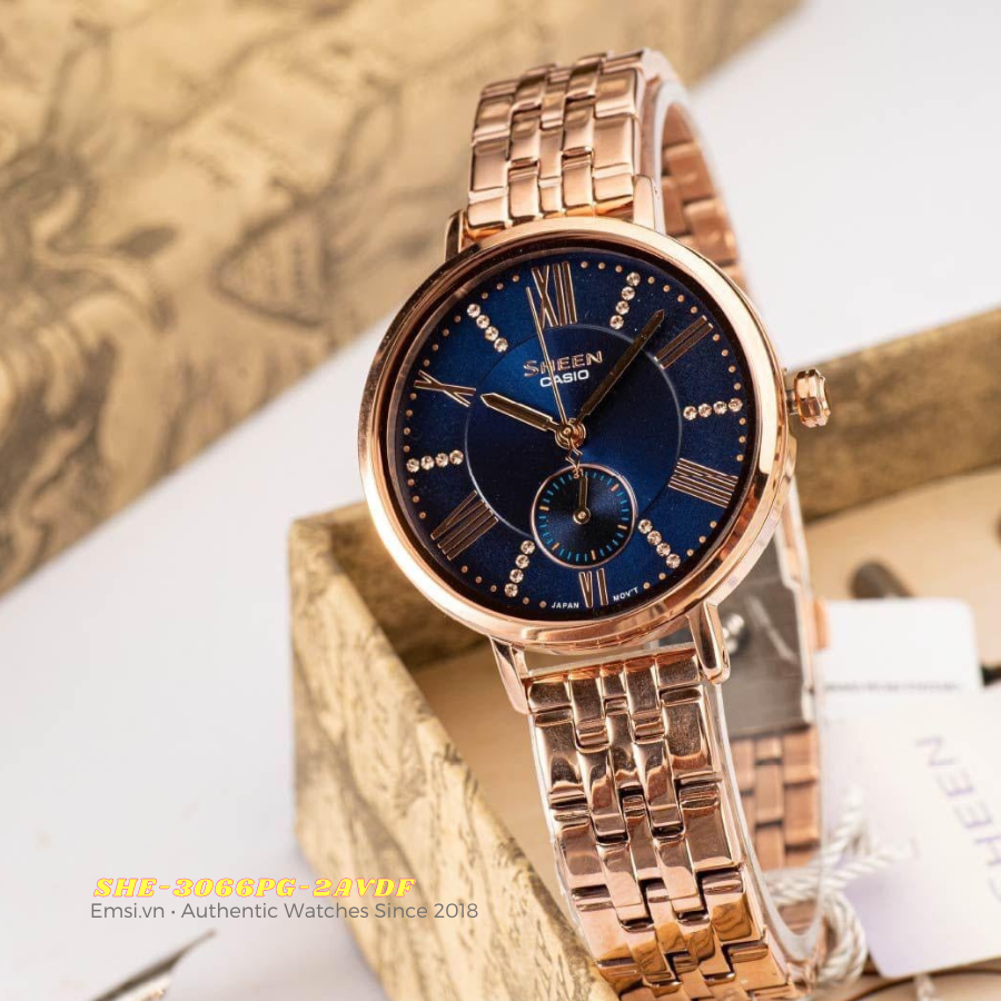 Casio Sheen SHE-3066PG-2AVDF - Đồng Hồ Nữ - Pin / Quartz - Kính Khoáng - Size Mặt 34mm - Bảo Hành 5 Năm - Chính Hãng