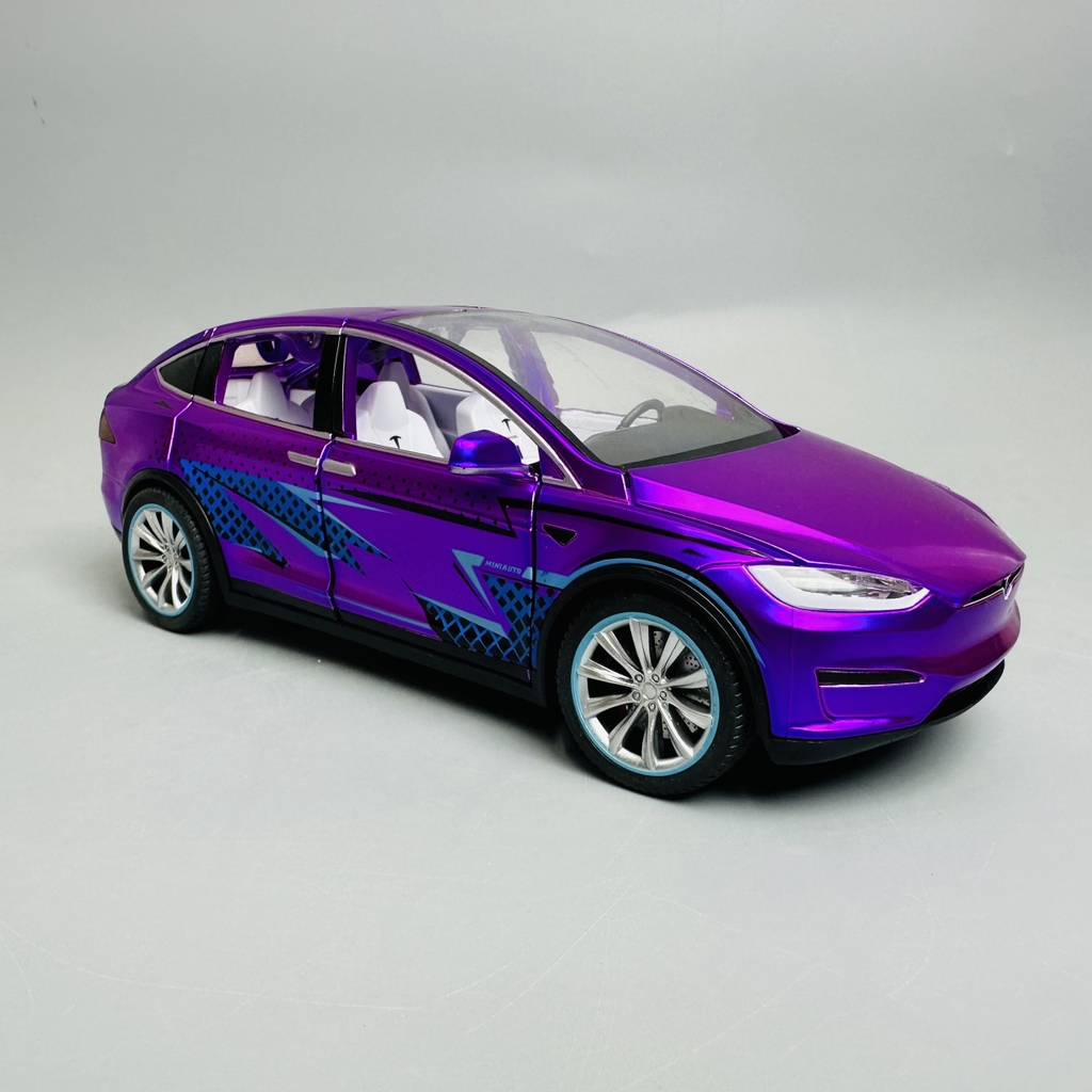 Mô Hình xe tesla tím tỉ lệ 1:24 Hợp kim có thể mở cửa - bánh sau chạy cót - Dài 21cm - rộng 9.5cm - cao 7cm - nặng : 800gram - FULL BOX : box màu SKU : oto277 - N3-K7-T4-S4