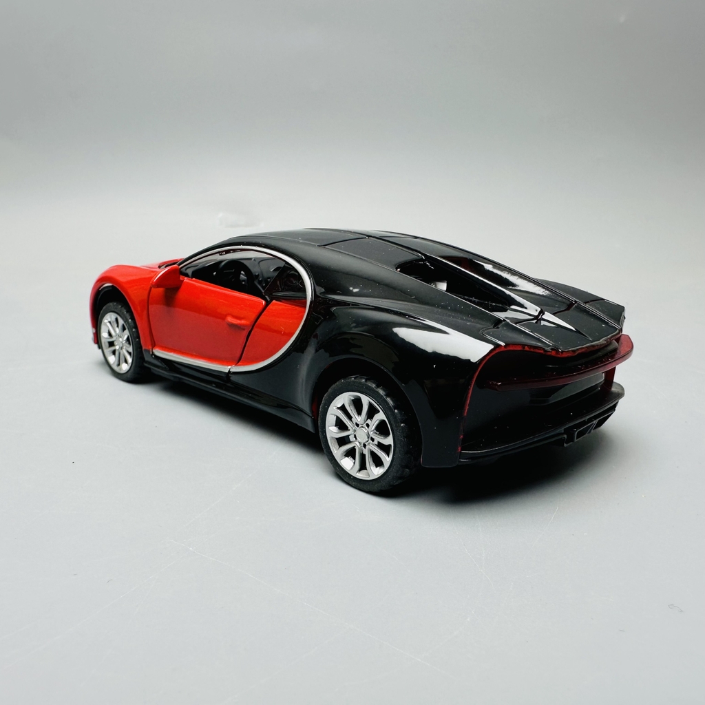 Mô Hình xe Bugati đen đỏ tỉ lệ 1:32 Hợp kim có thể mở cửa - bánh sau chạy cót - Dài 12.5cm - rộng 6cm - cao 3cm nặng : 200gram - FULL BOX : box màu SKU : oto206 - K68-T2-S2