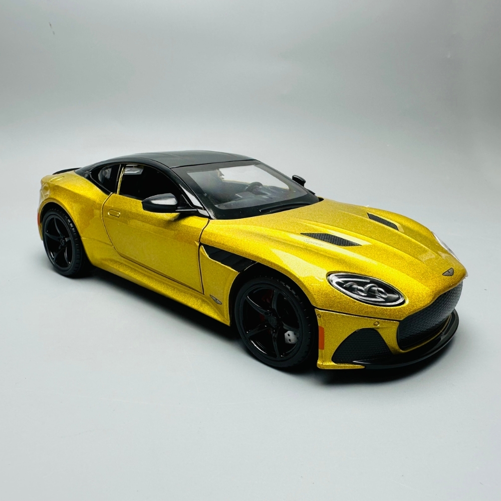 Mô Hình Xe aston martin vàng 1:22 Hợp kim có thể mở cửa - bánh sau chạy cót - Có tiếng - đèn pha sáng - Dài 20cm - rộng 9cm - cao 6cm - nặng ~ 1000gram - FULL BOX : box màu SKU : oto142