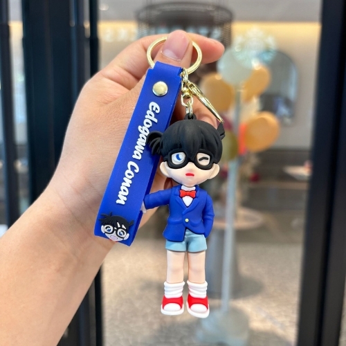 Móc Khóa Conan tay đút túi quần chỉ tay . Dây móc dài : 10cm - Mô Hình Cao : 7cm - Nặng 50gram - K75-T2-S9