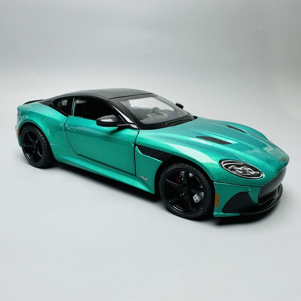 Mô Hình Xe aston martin xanh lá 1:22 Hợp kim có thể mở cửa - bánh sau chạy cót - Có tiếng - đèn pha sáng - Dài 20cm - rộng 9cm - cao 6cm - nặng ~ 1000gram - FULL BOX : box màu SKU : oto143