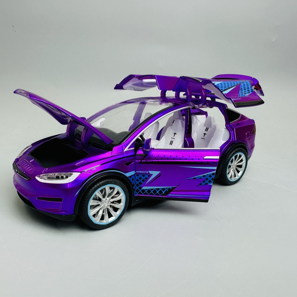 Mô Hình xe tesla tím tỉ lệ 1:24 Hợp kim có thể mở cửa - bánh sau chạy cót - Dài 21cm - rộng 9.5cm - cao 7cm - nặng : 800gram - FULL BOX : box màu SKU : oto277 - N3-K7-T4-S4