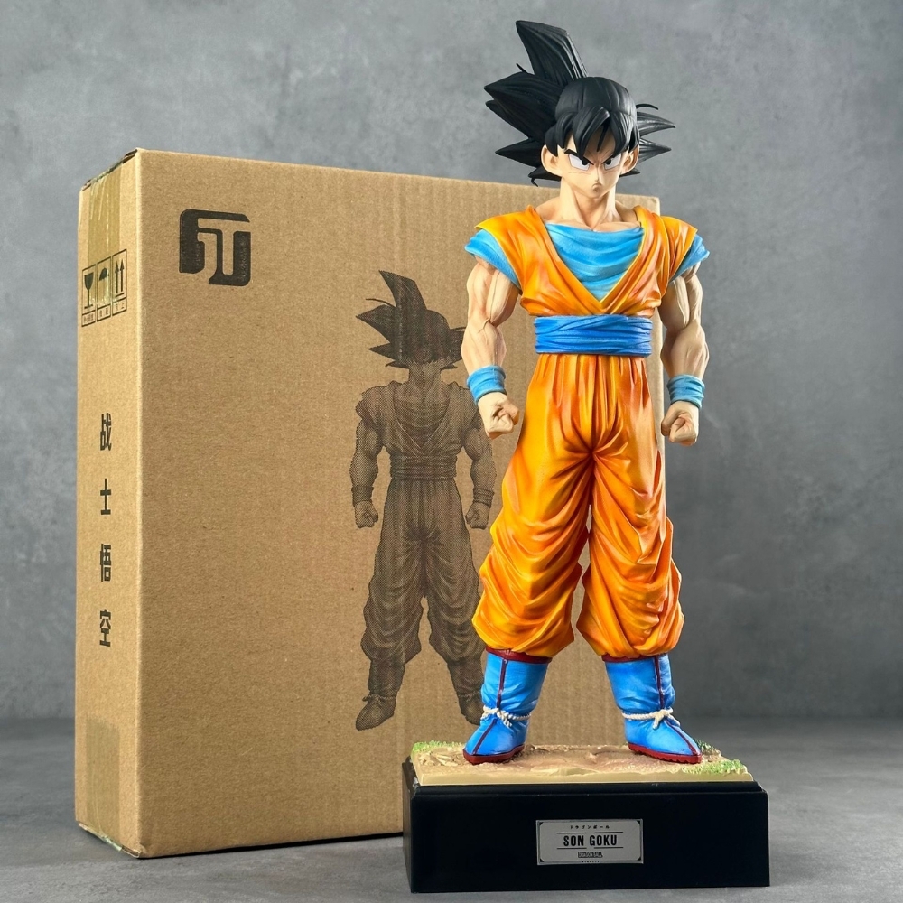 Mô Hình Songoku dáng đứng có base đẹp - 2 đầu thay thế - Cao 34cm - Nặng 700gram - Hộp Bìa carton - Figure anime Dragon ball