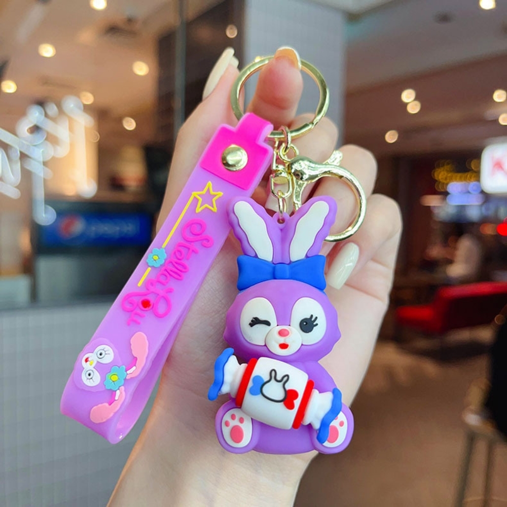 Móc khóa thỏ tím cầm kẹo - Dây móc dài : 11cm - Mô Hình Cao : 7cm - Nặng : 50gram - No Box  - SKU: moc152 - (Vat: 88223-7) - K79-T5-S12