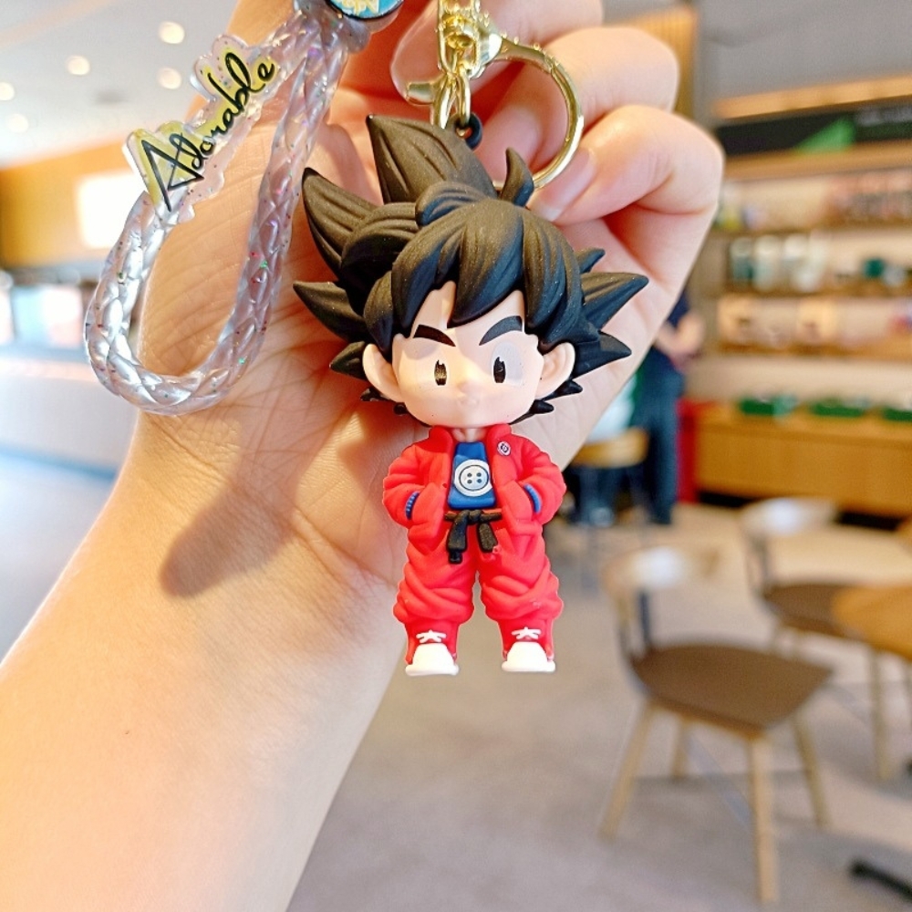 Móc khóa trang trí - goku sành điệu áo đỏ - Dây móc dài : 8.5cm - Mô Hình Cao : 8cm - Nặng : 50gram - No Box : bọc túi OPP -SKU : moc107- ( Vat : 88223-7 )- K79-T1-S4