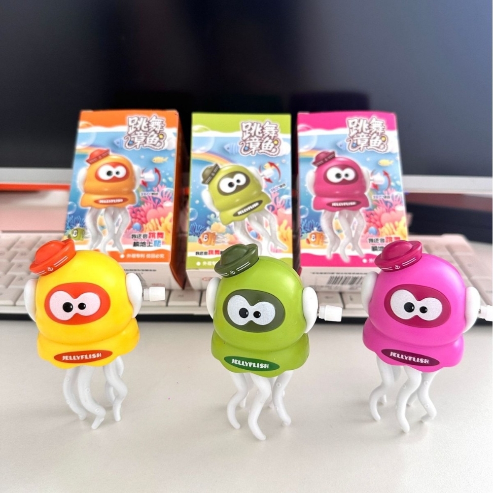 Đồ Chơi Trẻ Em mực nhỏ nhảy múa màu xanh chạy cót - Cao 10cm - Nặng 200gram - Hộp Màu - ht29b K77-T4-S11
