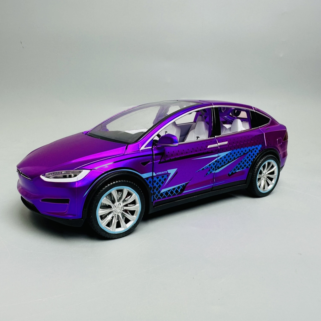 Mô Hình xe tesla tím tỉ lệ 1:24 Hợp kim có thể mở cửa - bánh sau chạy cót - Dài 21cm - rộng 9.5cm - cao 7cm - nặng : 800gram - FULL BOX : box màu SKU : oto277 - N3-K7-T4-S4