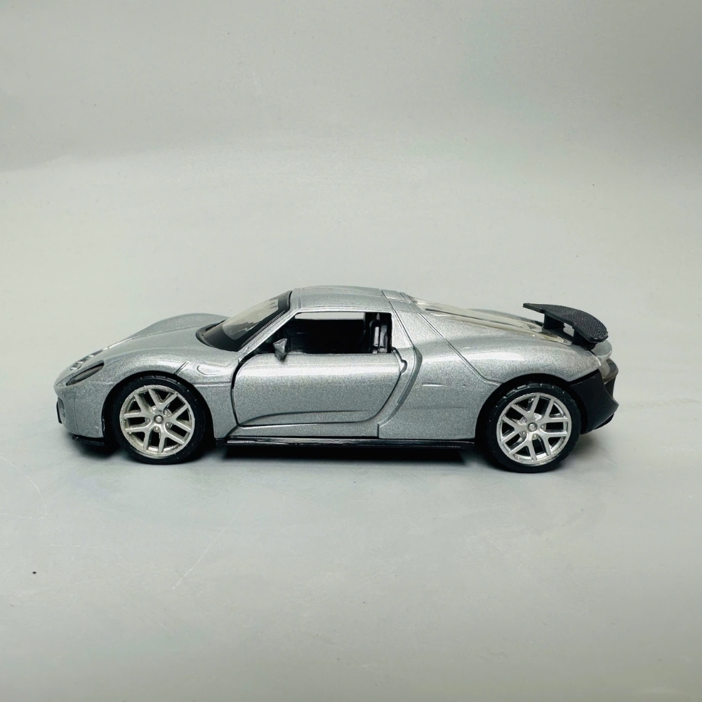 Mô Hình xe ferrari xám mới 1:36 Hợp kim có thể mở cửa - bánh sau chạy cót - Dài 12cm - rộng 5cm - cao 4cm nặng : 200gram - FULL BOX : box màu SKU : oto311 - N3-K4-T2-S2