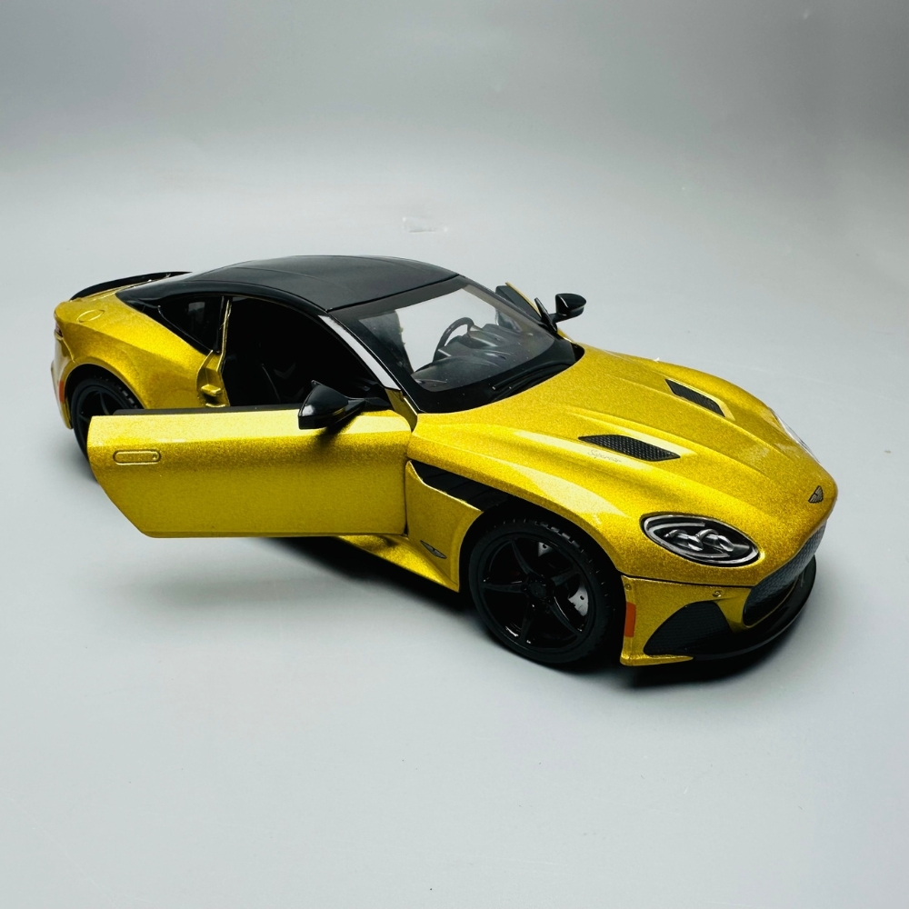 Mô Hình Xe aston martin vàng 1:22 Hợp kim có thể mở cửa - bánh sau chạy cót - Có tiếng - đèn pha sáng - Dài 20cm - rộng 9cm - cao 6cm - nặng ~ 1000gram - FULL BOX : box màu SKU : oto142