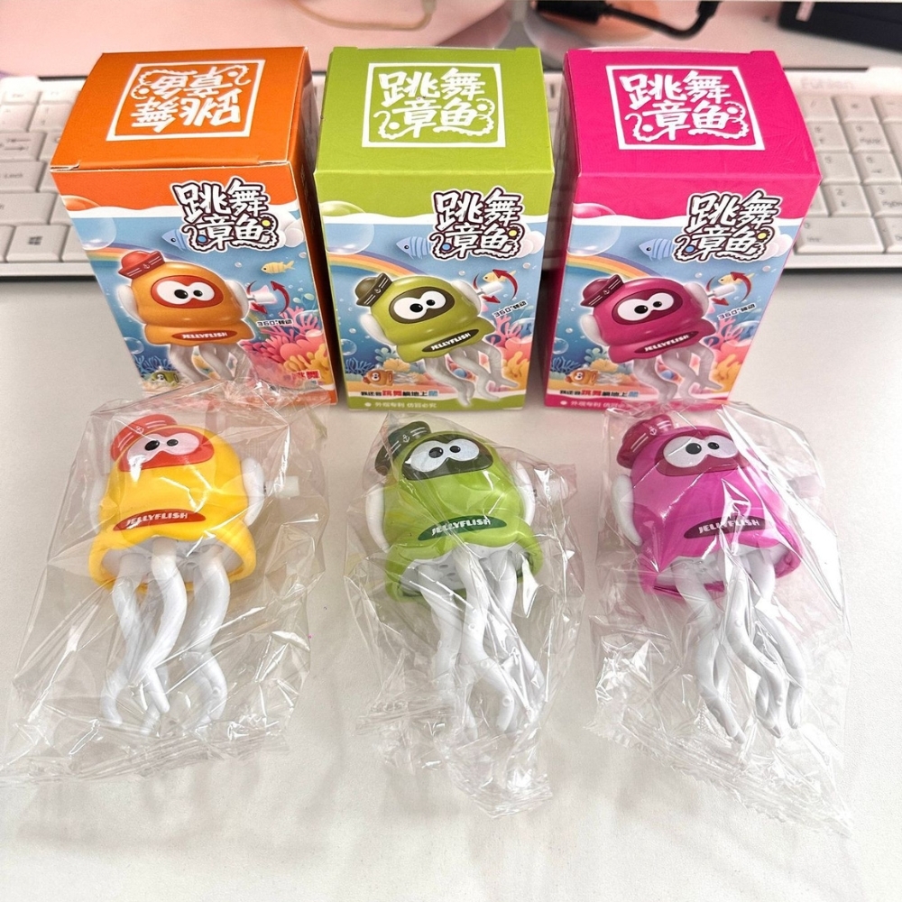 Đồ Chơi Trẻ Em mực nhỏ nhảy múa màu cam chạy cót - Cao 10cm - Nặng 200gram - Hộp Màu - ht29a K77-T4-S12