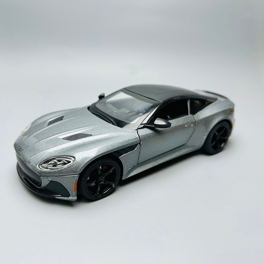 Mô Hình Xe aston martin đen xám 1:22 Hợp kim có thể mở cửa - bánh sau chạy cót - Có tiếng - đèn pha sáng - Dài 20cm - rộng 9cm - cao 6cm - nặng ~ 1000gram - FULL BOX : box màu SKU : oto140