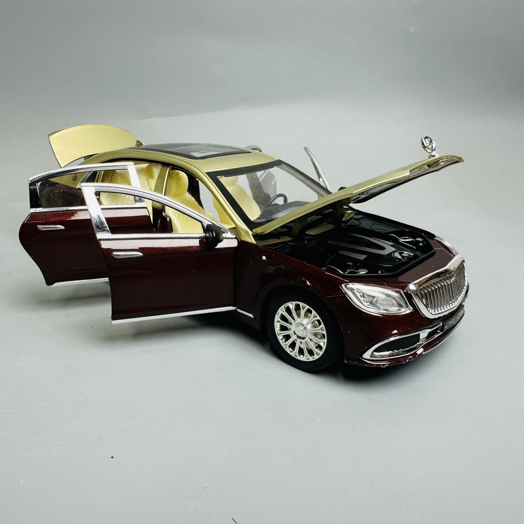 Mô Hình xe mẹc maybach nâu đồng tỉ lệ 1:24 Hợp kim có thể mở cửa - bánh sau chạy cót - Dài 21cm - rộng 9cm - cao 5cm - nặng : 1000gram - FULL BOX : box màu SKU : oto299 n3-k7-t2-s4