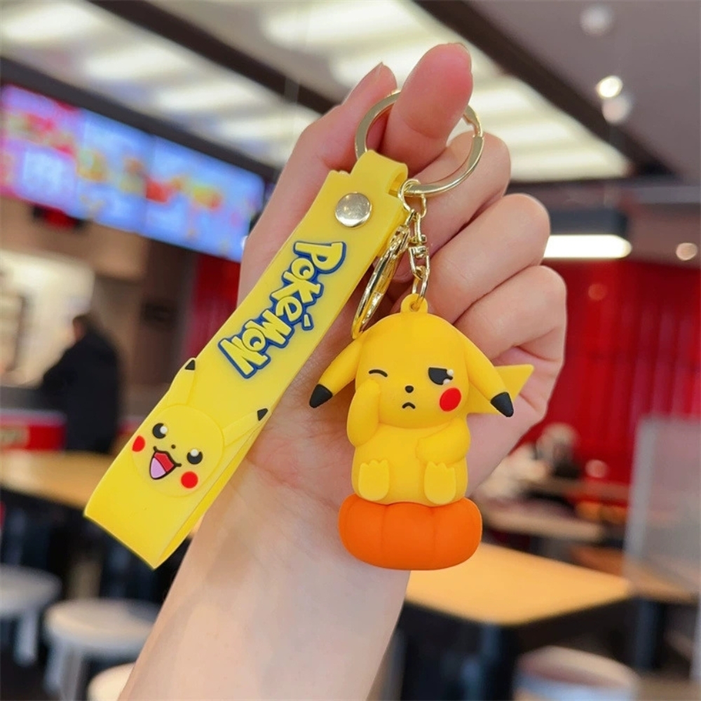 móc khóa pikachu ngồi bí ngô dụi mắt - dây dài 11cm mô hình cao 6cm - nặng : 50gram - SKU: moc229 - (Vat: MK001) -  K76-T1-S5