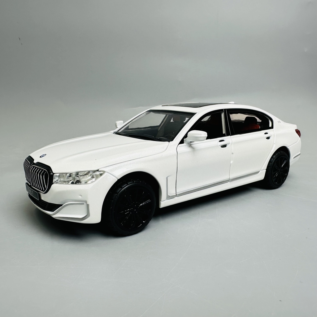 Mô Hình xe bmw trắng tỉ lệ 1:24 Hợp kim có thể mở cửa - bánh sau chạy cót - Dài 22cm - rộng 9cm - cao 6cm - nặng : 1200gram - FULL BOX : box màu SKU : oto291 - N3-K7-T1-S3