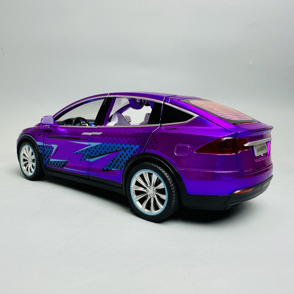 Mô Hình xe tesla tím tỉ lệ 1:24 Hợp kim có thể mở cửa - bánh sau chạy cót - Dài 21cm - rộng 9.5cm - cao 7cm - nặng : 800gram - FULL BOX : box màu SKU : oto277 - N3-K7-T4-S4