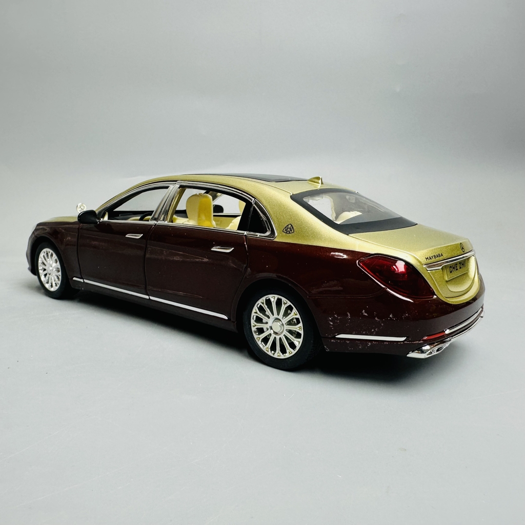 Mô Hình xe mẹc maybach nâu đồng tỉ lệ 1:24 Hợp kim có thể mở cửa - bánh sau chạy cót - Dài 21cm - rộng 9cm - cao 5cm - nặng : 1000gram - FULL BOX : box màu SKU : oto299 n3-k7-t2-s4