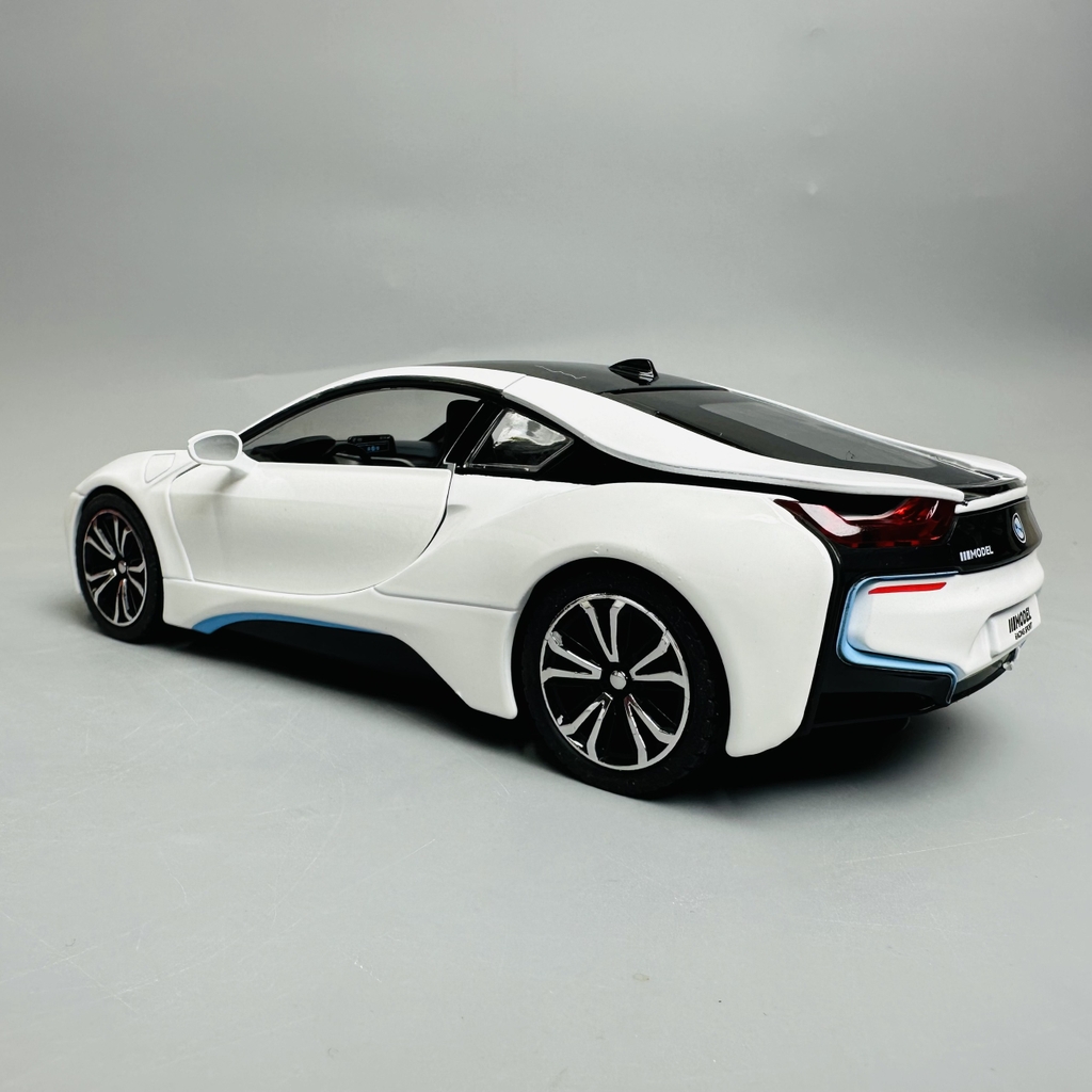 Mô Hình xe bmw i8 trắng tỉ lệ 1:22 Hợp kim có thể mở cửa - bánh sau chạy cót - Dài 21cm - rộng 9cm - cao 5cm - nặng : 800gram - FULL BOX : box màu SKU : oto292 - N3-K8-T3-S4