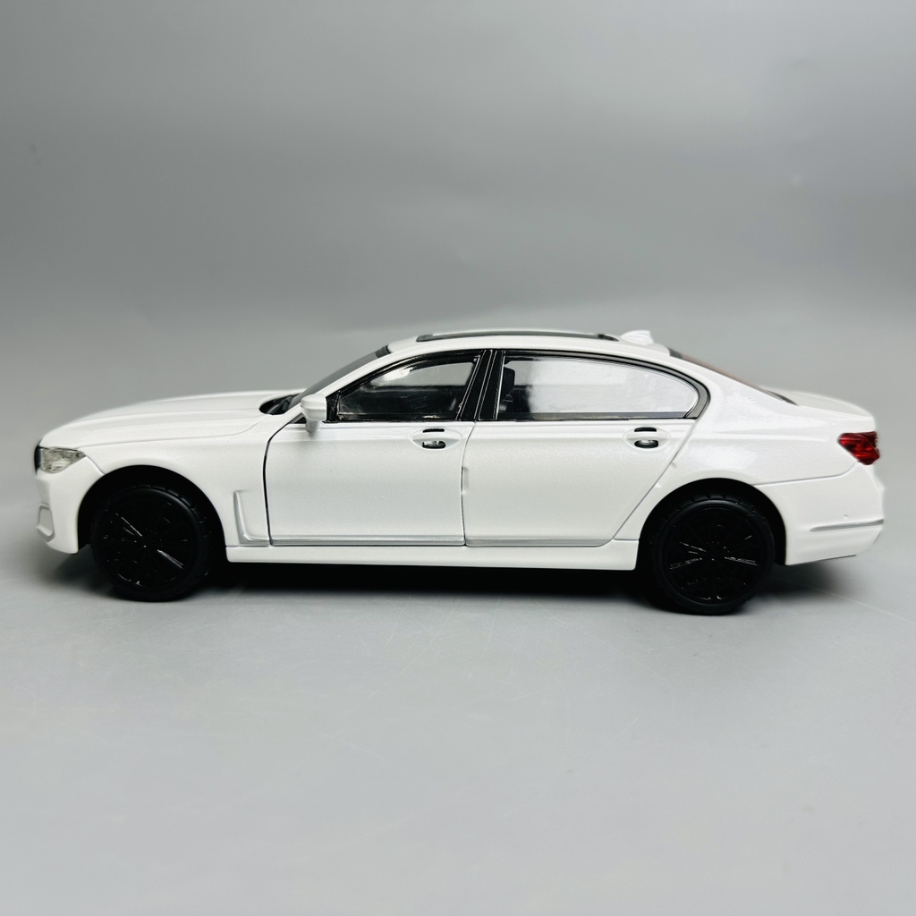 Mô Hình xe bmw trắng tỉ lệ 1:24 Hợp kim có thể mở cửa - bánh sau chạy cót - Dài 22cm - rộng 9cm - cao 6cm - nặng : 1200gram - FULL BOX : box màu SKU : oto291 - N3-K7-T1-S3