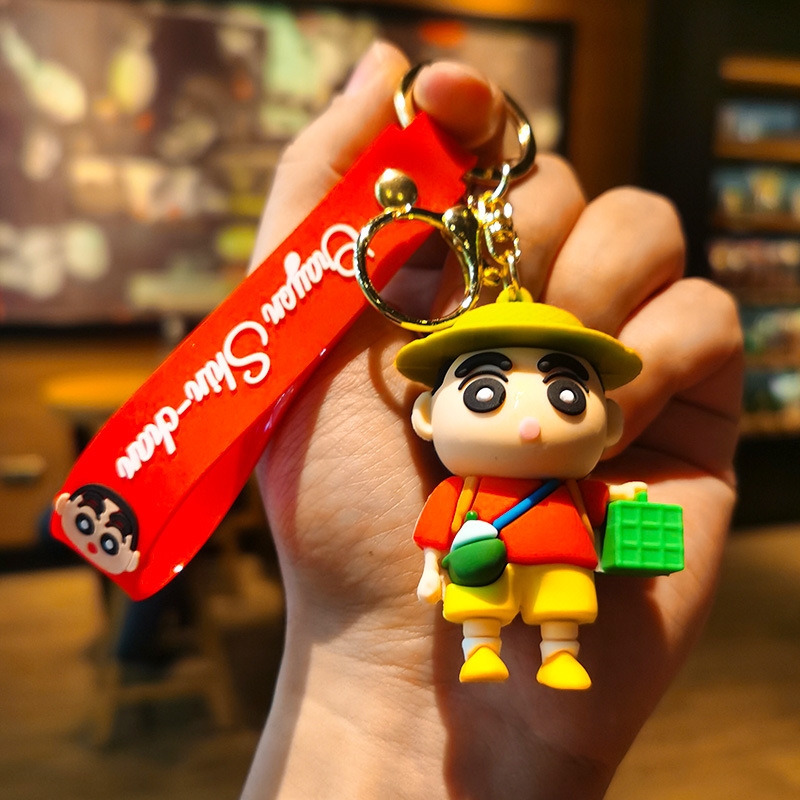 Móc Khóa Shin đội mũ cầm hộp cơm . Dây móc dài : 10cm - Mô Hình Cao : 6cm - Nặng 50gram K76-T7-S4