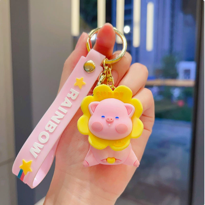 Móc khóa đầu lợn hoa vàng đầu có lò xo có thể xoay được đầu - dây dài 11cm mô hình cao 7cm - nặng : 50gram - SKU: moc209 - (Vat: MK001) - K77-T6-S6