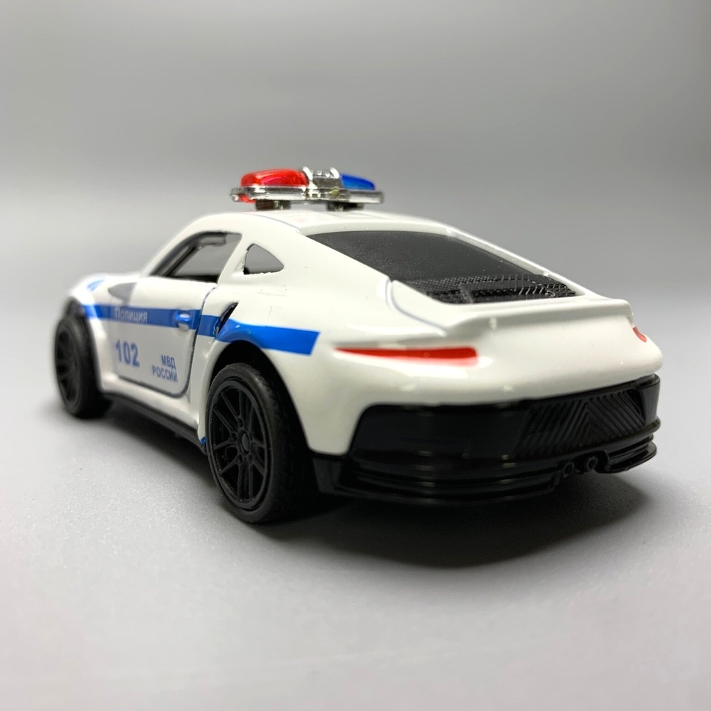 Mô Hình xe police Porsche 911 trắng tỉ lệ 1:43 Hợp kim có thể mở cửa - bánh sau chạy cót - Dài 10cm - cao 3cm - nặng 200gram - Figure Oto - FULL BOX : box màu - SKU : oto6 số25