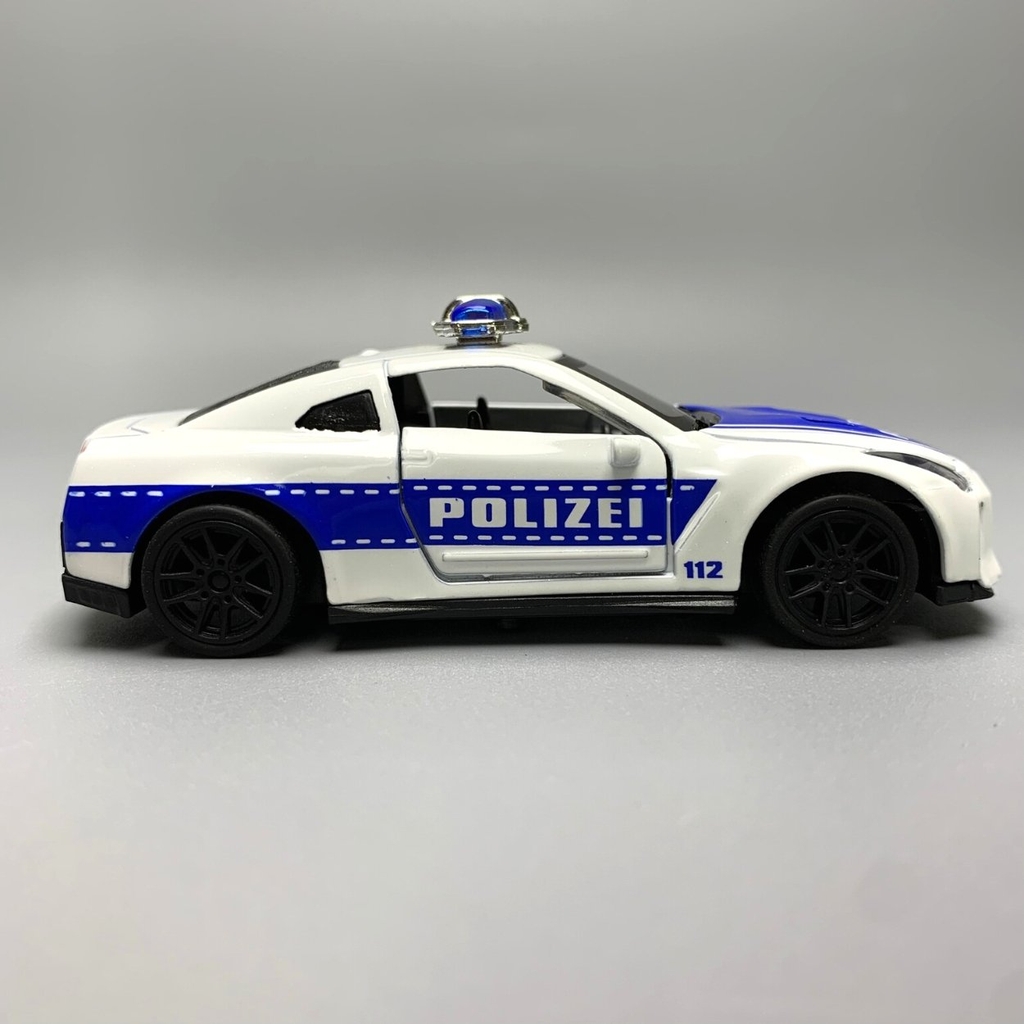 Mô Hình xe NISSAN police  GTR tỉ lệ 1:43 Hợp kim có thể mở cửa - bánh sau chạy cót - Dài 10cm - cao 3cm - nặng 200gram - Figure Oto - FULL BOX : box màu - K69-T2-S10