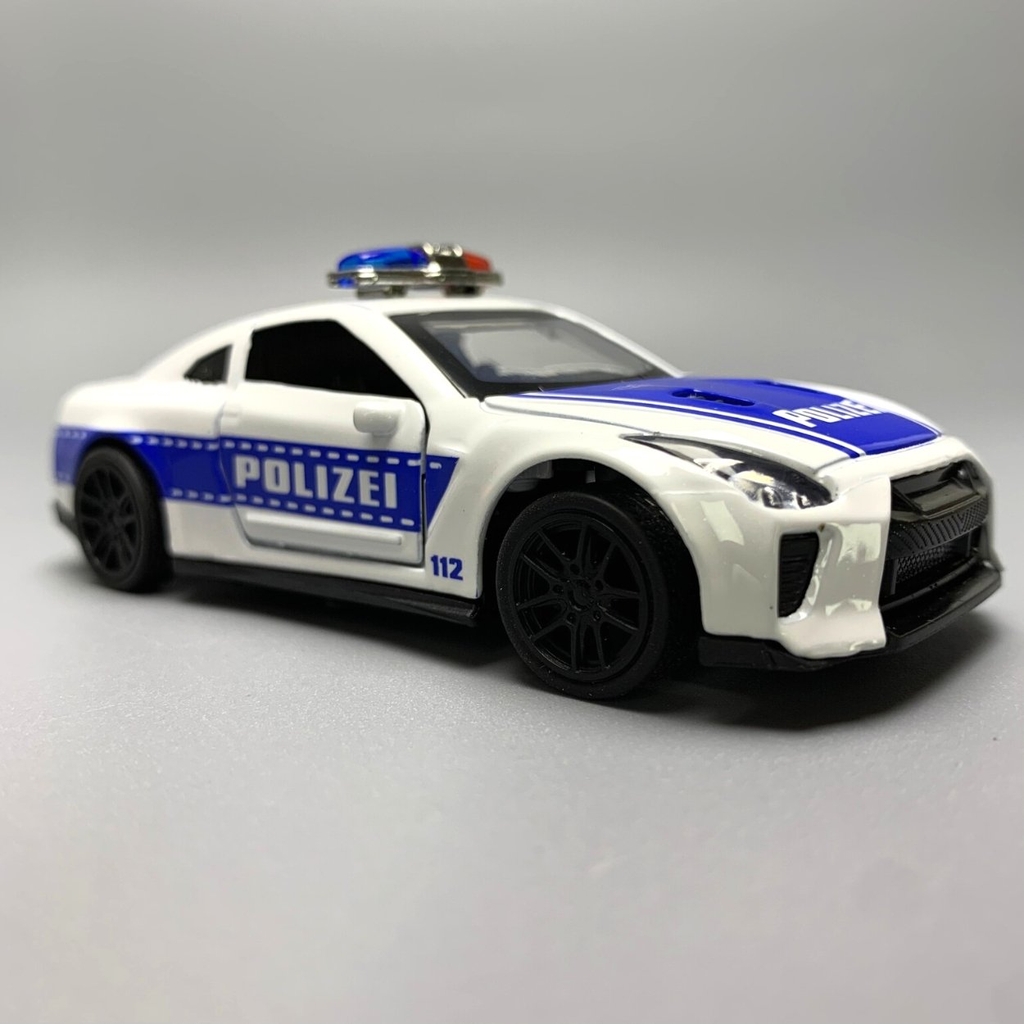 Mô Hình xe NISSAN police  GTR tỉ lệ 1:43 Hợp kim có thể mở cửa - bánh sau chạy cót - Dài 10cm - cao 3cm - nặng 200gram - Figure Oto - FULL BOX : box màu - K69-T2-S10