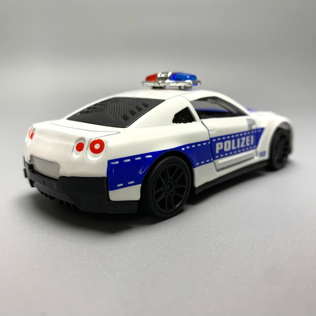 Mô Hình xe NISSAN police  GTR tỉ lệ 1:43 Hợp kim có thể mở cửa - bánh sau chạy cót - Dài 10cm - cao 3cm - nặng 200gram - Figure Oto - FULL BOX : box màu - K69-T2-S10