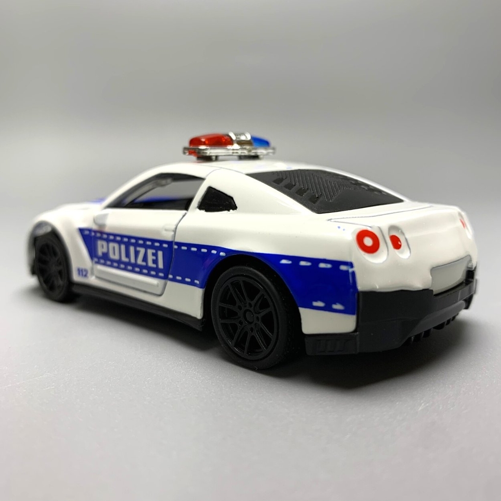Mô Hình xe NISSAN police  GTR tỉ lệ 1:43 Hợp kim có thể mở cửa - bánh sau chạy cót - Dài 10cm - cao 3cm - nặng 200gram - Figure Oto - FULL BOX : box màu - K69-T2-S10