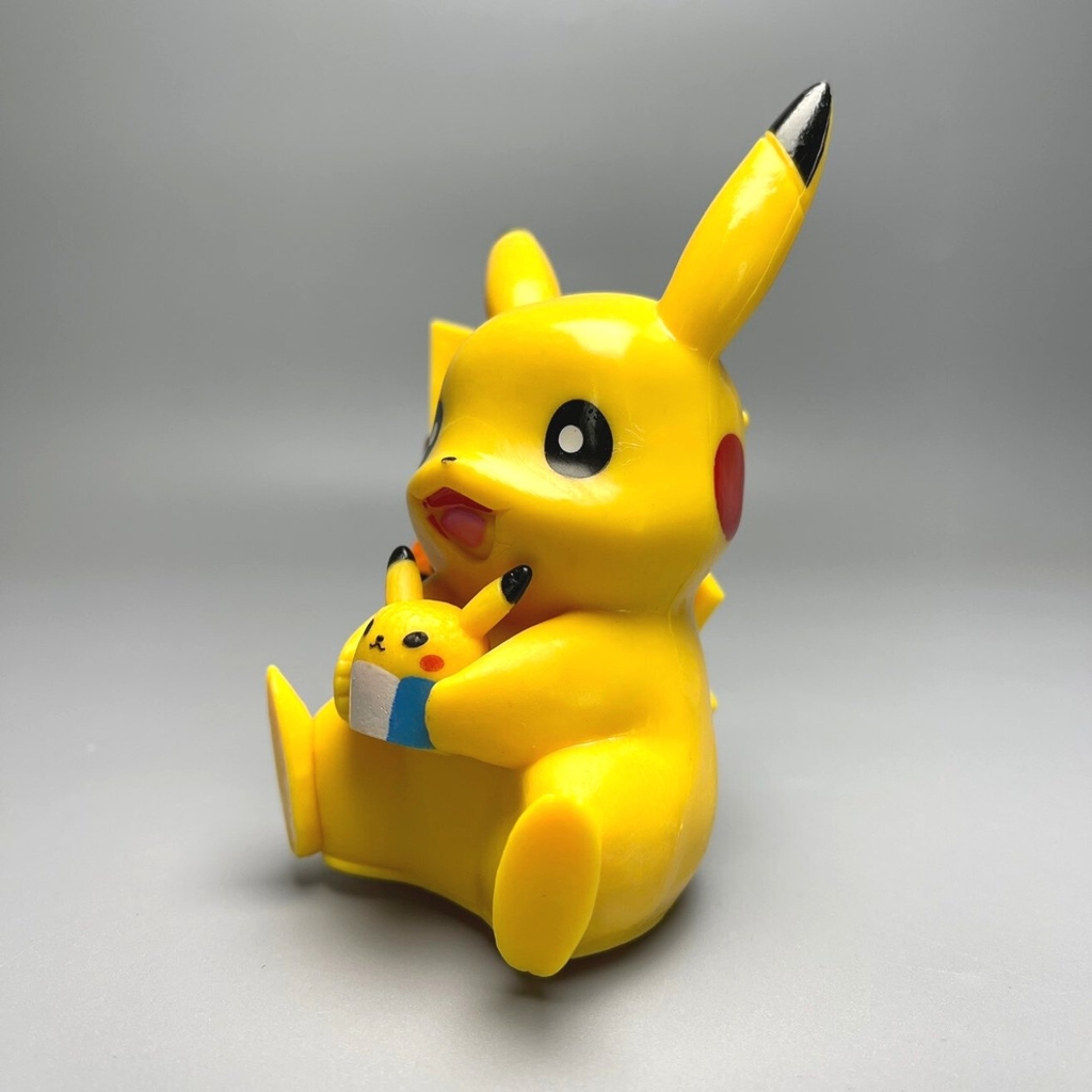 Mô Hình POKEMON Pikachu ngồi cười - Cao 12cm - nặng 100gram - Figure POKEMON No box : bọc túi OPP