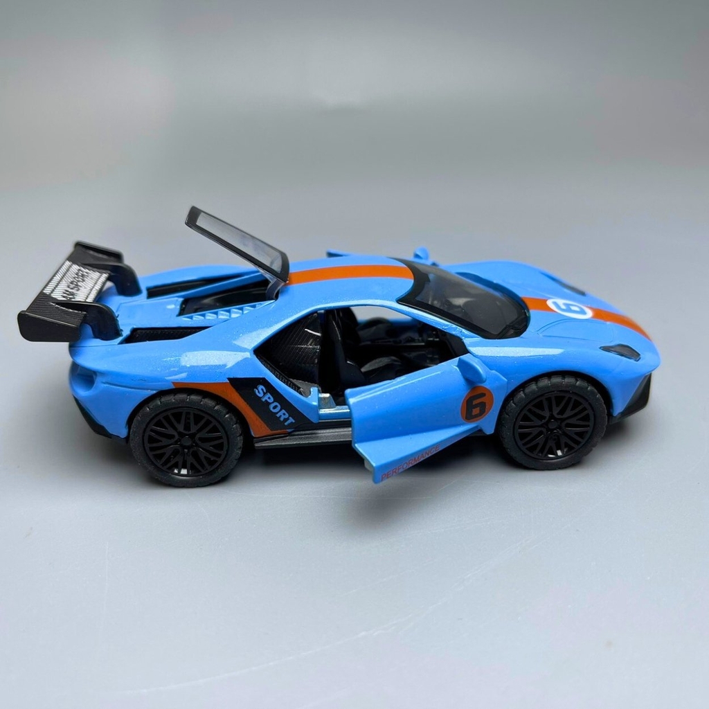 Mô Hình xe Ferrari màu xanh trời - tỉ lệ 1:36 Hợp kim có thể mở cửa - bánh sau chạy cót - Dài 12cm - rộng 5cm - cao 4cm nặng : 200gram - FULL BOX : box màu - SKU : oto47 - N3-K10-T2-S1
