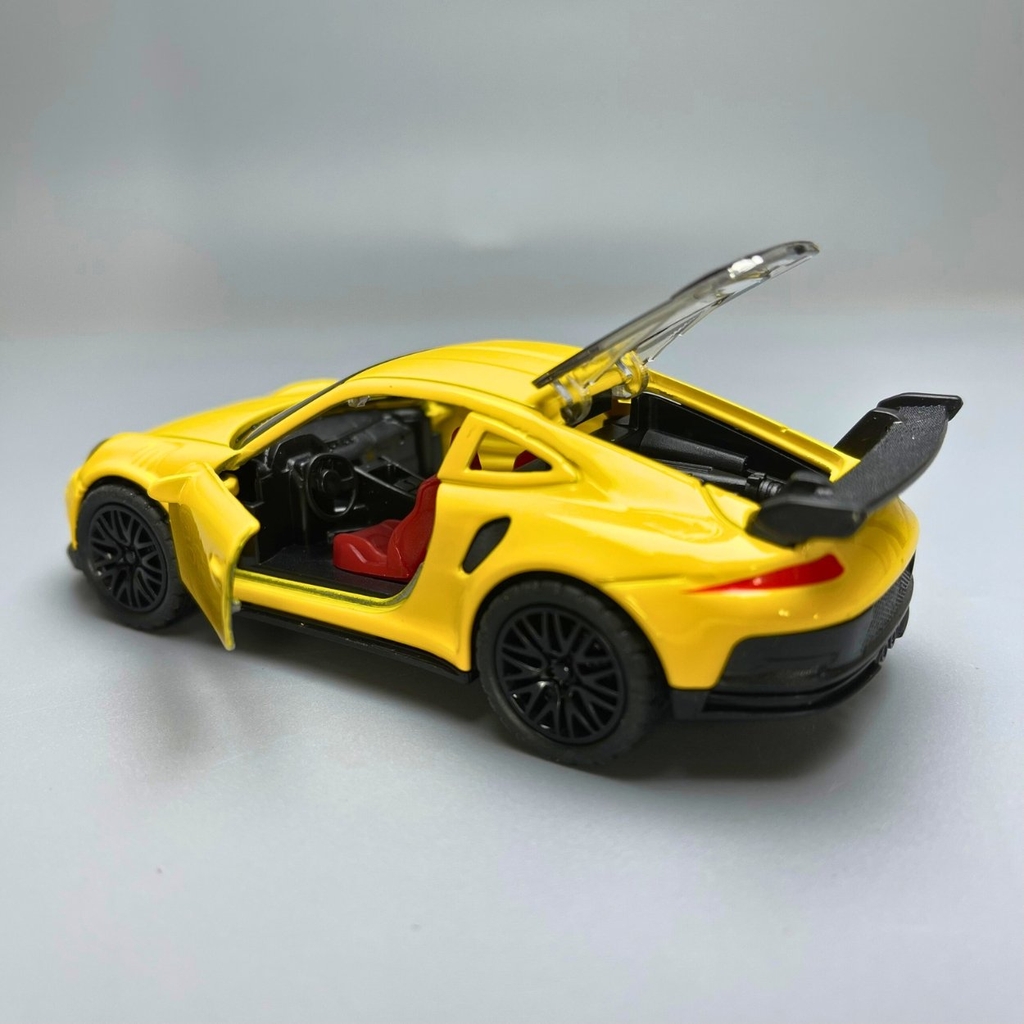 Mô Hình xe Porsche 911 màu vàng - tỉ lệ 1:36 Hợp kim có thể mở cửa - bánh sau chạy cót - Dài 12cm - rộng 5cm - cao 3.5cm - nặng : 200gram - FULL BOX : box màu - SKU : oto65 - N3-K9-T2-S3