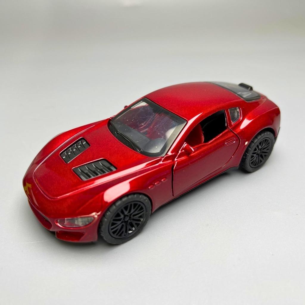 Mô Hình xe Maserati 3200 GT màu đỏ - tỉ lệ 1:36 Hợp kim có thể mở cửa - bánh sau chạy cót - Dài 12cm - rộng 5cm - cao 3.5cm - nặng : 200gram - FULL BOX : box màu